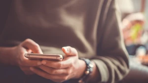 woman holding smartphone